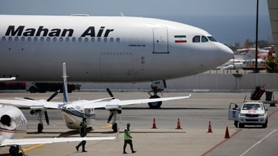 A Mahan Air jet at Simón Bolívar International Airport outside Caracas, Venezuela. A Mahan Air jet at Simón Bolívar International Airport outside Caracas, Venezuela.