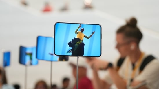 The iPhone Duo is displayed during an announcement of new products on the Apple campus in Cupertino, California.