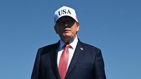 Donald Trump arrives to speak during a "Steel Across America" event on the Ellipse near the White House on September 8.