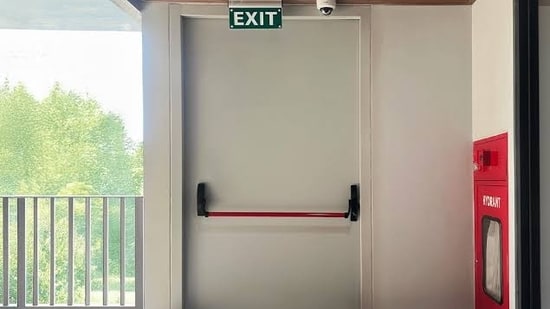 Emergency exit doors always open outwards to facilitate safe exit. 
