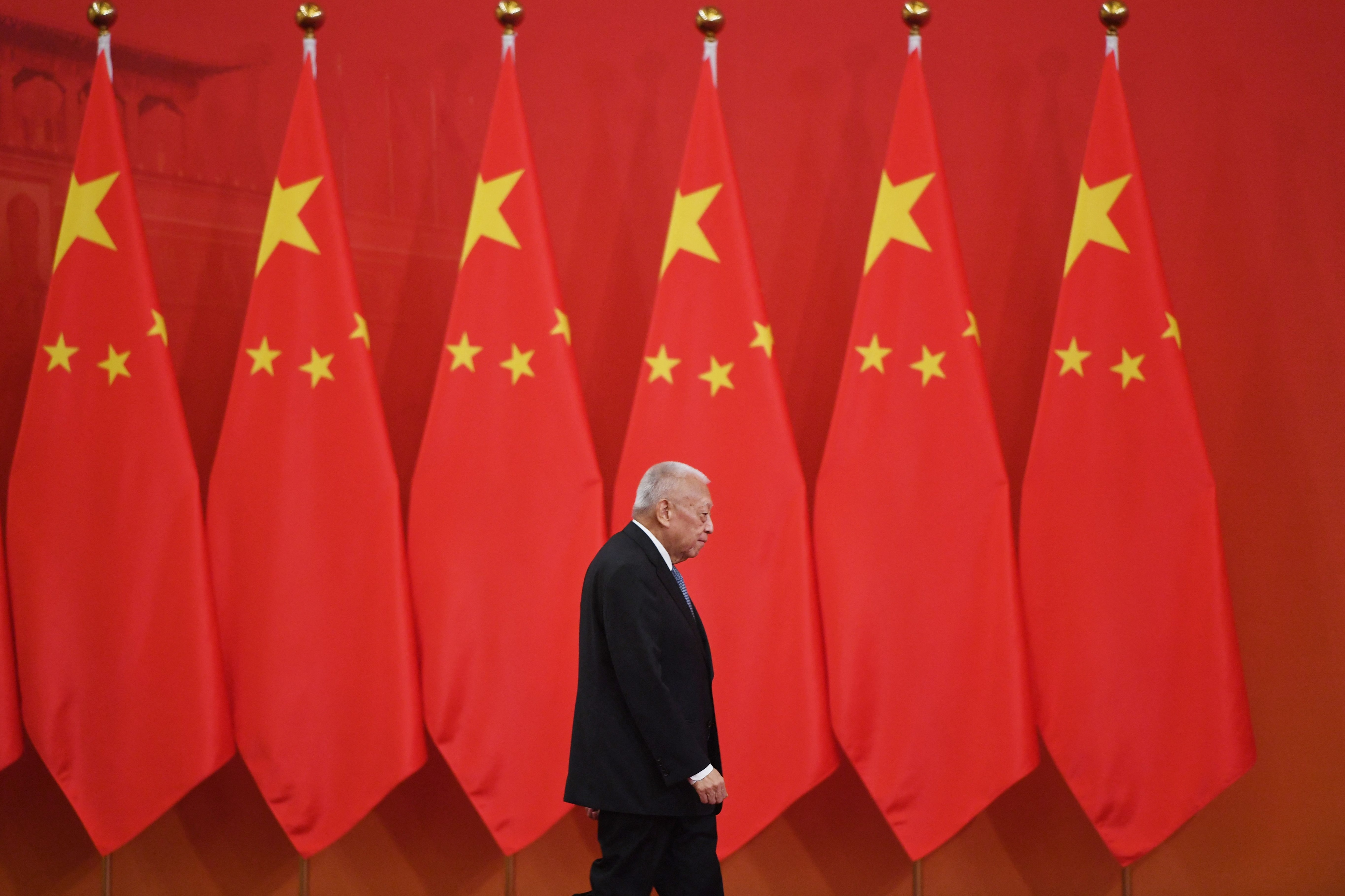 Former Hong Kong chief executive Tung Chee-hwa walks out to receive an award from Chinese President Xi Jinping at a ceremony in Beijing's Great Hall of the People on September 29, 2019. (AFP) Former Hong Kong chief executive Tung Chee-hwa walks out to receive an award from Chinese President Xi Jinping at a ceremony in Beijing's Great Hall of the People on September 29, 2019. (AFP)