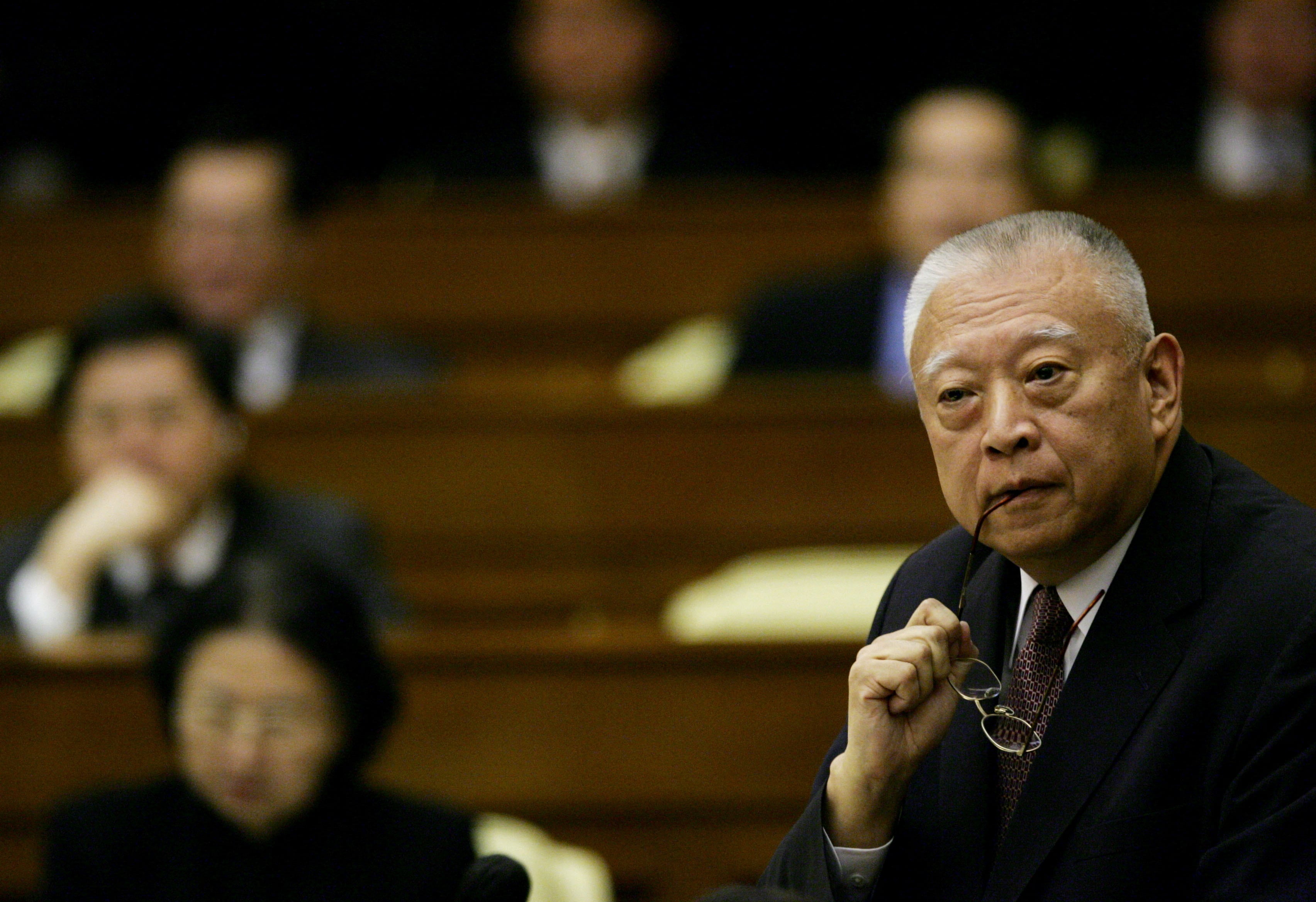 Hong Kong's then Chief Executive Tung Chee-hwa listens during a Legislative Council meeting, October 14, 2004. (REUTERS)