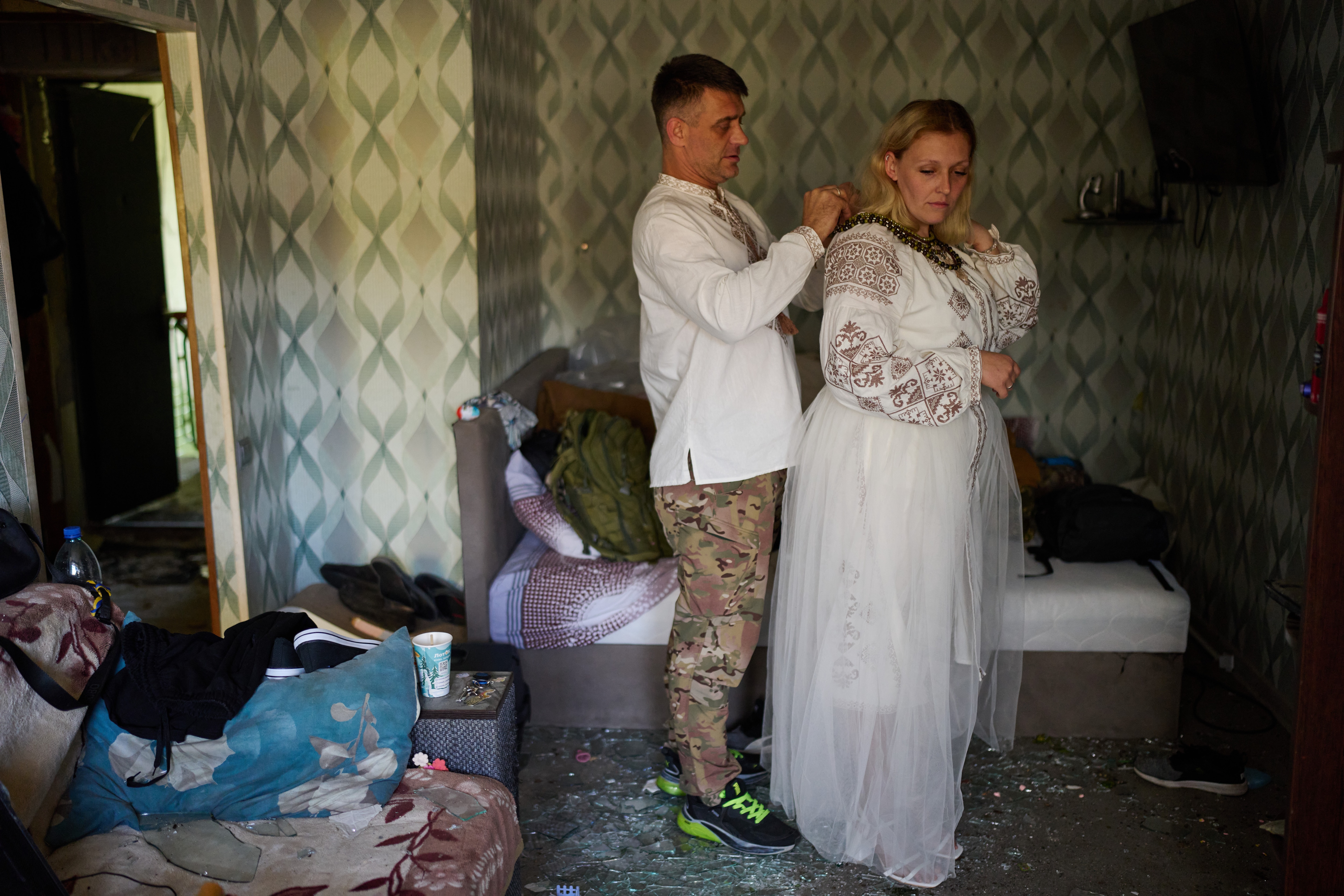 Liudmyla Ryzhak, right, and her fiancee Leonid Ryzhak get ready for their wedding ceremony in their damaged apartment, following a Russian missile and drone attack in Kyiv, Ukraine, Tuesday, Sept. 8, 2026. (AP Photo/Francisco Seco) (AP Photo) Liudmyla Ryzhak, right, and her fiancee Leonid Ryzhak get ready for their wedding ceremony in their damaged apartment, following a Russian missile and drone attack in Kyiv, Ukraine, Tuesday, Sept. 8, 2026. (AP Photo/Francisco Seco) (AP Photo)