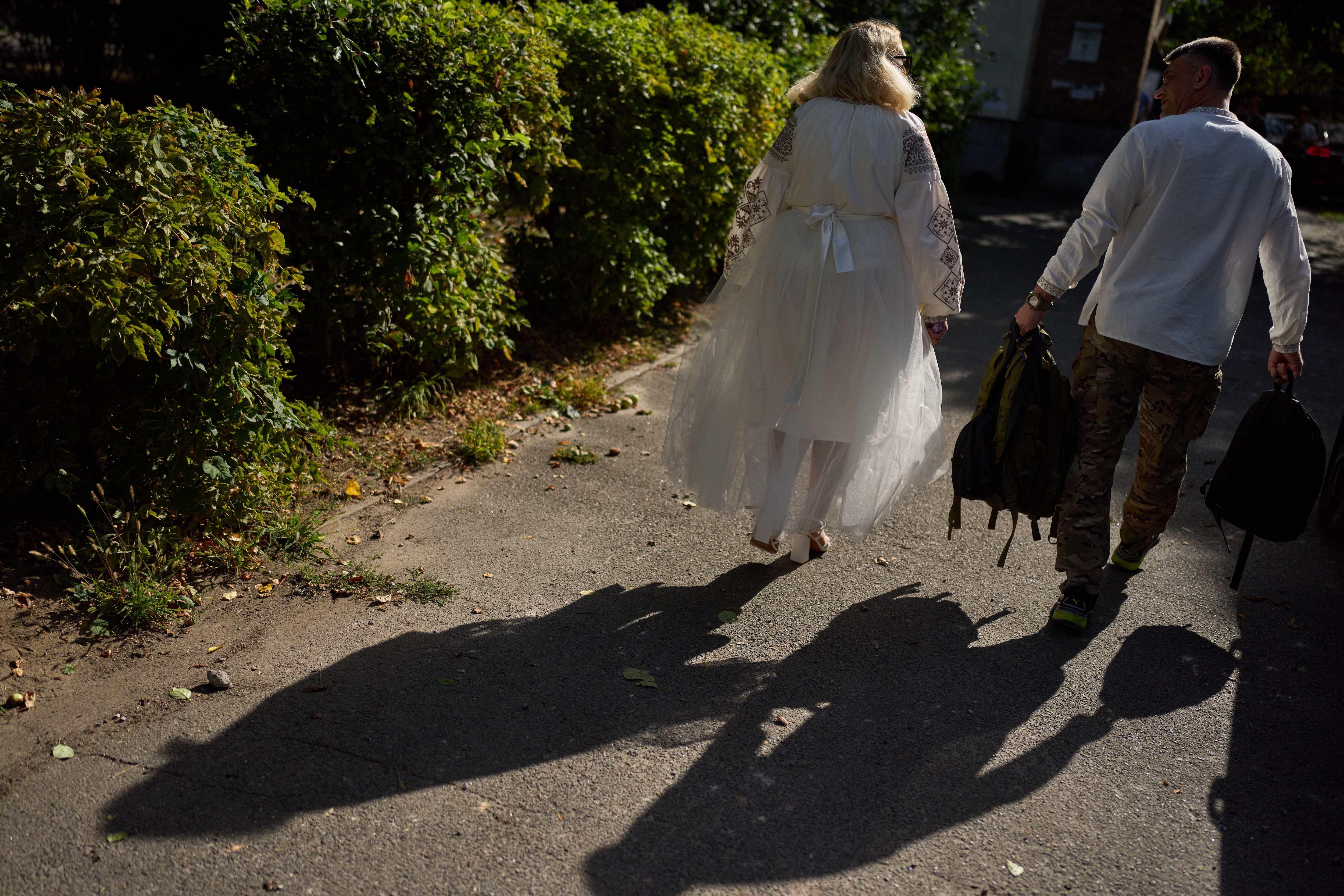 The ceremony went ahead as the officiant told them, "Love is when two people become a team." (AP Photo) The ceremony went ahead as the officiant told them, "Love is when two people become a team." (AP Photo)