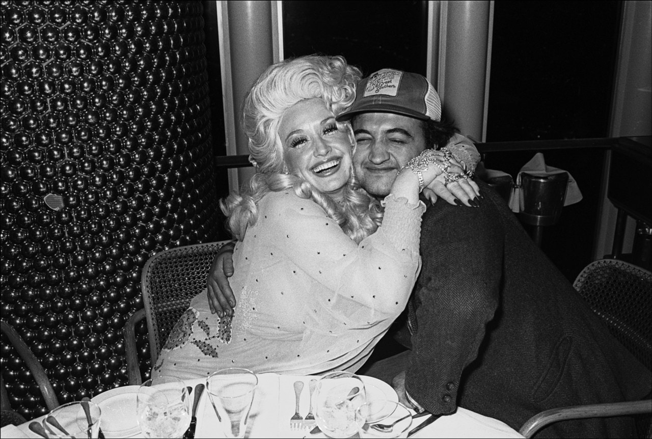 Dolly Parton and comedian John Belushi at Windows on the World in 1977.