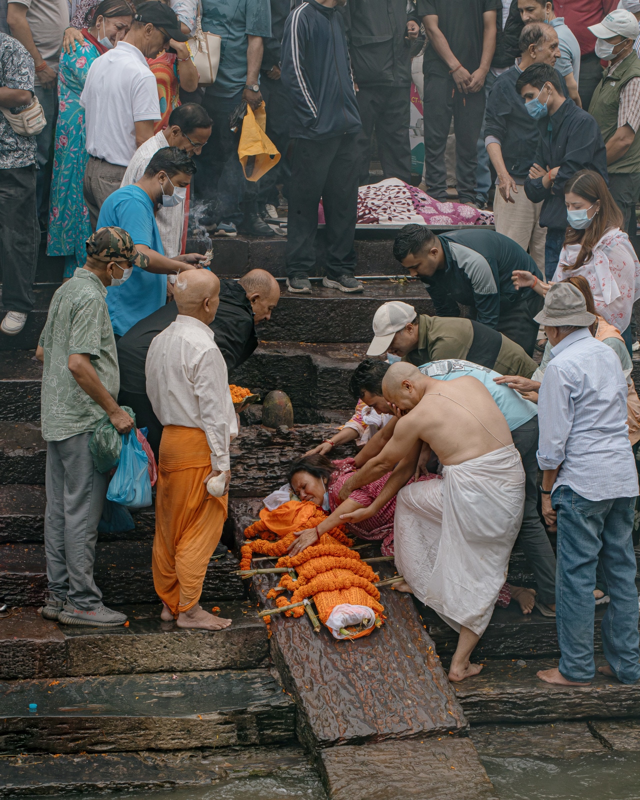 Families used effigies to perform funeral rites for missing relatives at Pashupatinath Temple, Kathmandu. Families used effigies to perform funeral rites for missing relatives at Pashupatinath Temple, Kathmandu.