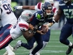 Sam Darnold, who started the game for Seattle, was forced to leave Wednesday night's contest after suffering an injury.