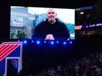 A video featuring Sen. John Fetterman, D-Pa., plays at the Republican convention in Dallas. 