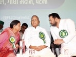 RJD chief Lalu Prasad (Centre), former Bihar CM Rabri Devi (L), Leader of Opposition and RJD leader Tejashwi Yadav (L).