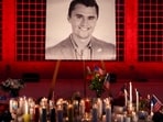 FILE PHOTO: Candles and flowers are placed near an image of Charlie Kirk, during a vigil at Orem City Center Park, after U.S. right-wing activist and commentator, Charlie Kirk, an ally of U.S. President Donald Trump, was fatally shot during an event at Utah Valley University, in Orem, Utah, U.S. September 11, 2025.  REUTERS/Jim Urquhart/File Photo