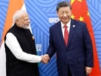 FILE PHOTO: Chinese President Xi Jinping and Prime Minister Narendra Modi on the sidelines of the Brics Summit in Kazan, Russia October 23, 2024. (VIA REUTERS)