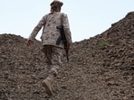 This frame grab taken from AFPTV video footage shows a fighter from the Saudi-backed Nation's Shield Forces deployed in Yemen's Al-Kadha area, west of Taiz province, on September 10, 2026. 
