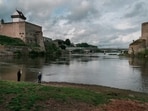 Hermann Castle in Narva, Estonia, on the left faces Ivangorod Fortress in Russia across the Narva River.