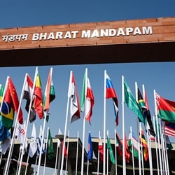 A view of the national flags of countries participating in the 18th BRICS Summit hoisted outside the Bharat Mandapam, in New Delhi.
