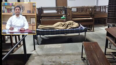 A viral image of the college principal Vajala Ravi, who chose to sleep on campus to ensure the displaced students felt safe through the night, has won the hearts of students. A viral image of the college principal Vajala Ravi, who chose to sleep on campus to ensure the displaced students felt safe through the night, has won the hearts of students.