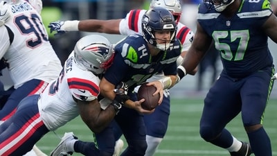 Sam Darnold, who started the game for Seattle, was forced to leave Wednesday night's contest after suffering an injury. (AP Photo) Sam Darnold, who started the game for Seattle, was forced to leave Wednesday night's contest after suffering an injury. (AP Photo)