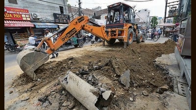 Repair work underway in the Krishna Nagar area near Saggu Chowk, where the road gave way on Thursday. (Gurpreet Singh/HT) Repair work underway in the Krishna Nagar area near Saggu Chowk, where the road gave way on Thursday. (Gurpreet Singh/HT)