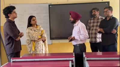 Saurav Das, co-convener of the Cockroach Janta Party, and his team during a visit to School of Eminence (SoE) in Sector 32, Ludhiana. (HT)