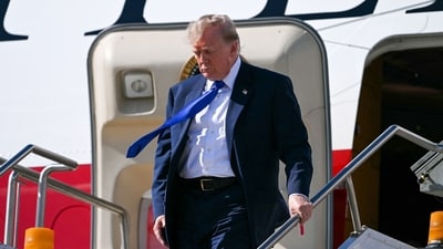 After reporters asked whether Trump was sure the jet was safe to fly, the US President said: "Yeah, I am, or I wouldn't be on it." (AFP)