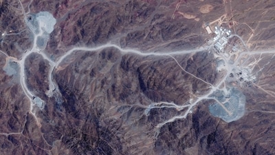 A satellite view shows tunnel entrances at Pickaxe Mountain, of the Natanz nuclear facility, near Natanz, Iran, June 30, 2026. (via REUTERS)