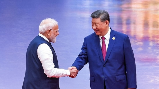 The Chinese president's visit to India comes as both Delhi and Beijing work towards renewing their ties after years of strain caused by border tensions. (AFP)