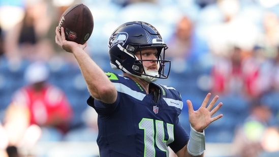 Quarterback Sam Darnold appeared to be limping after being driven into the ground.