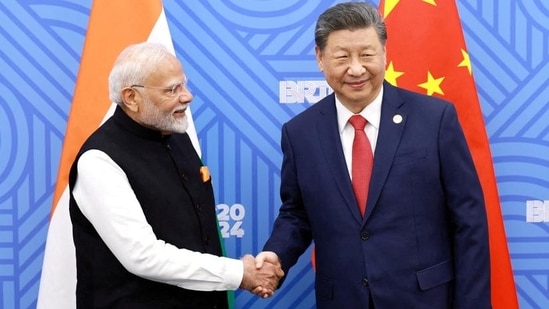 FILE PHOTO: Chinese President Xi Jinping and Prime Minister Narendra Modi on the sidelines of the Brics Summit in Kazan, Russia October 23, 2024. (VIA REUTERS)