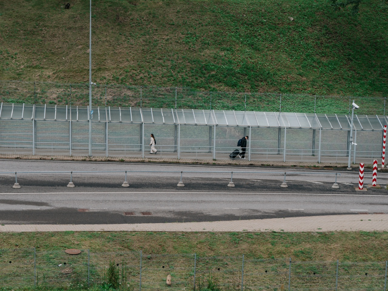 People crossing the border between Russia and Estonia. People crossing the border between Russia and Estonia.