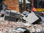 MCD Workers barricades the area around the  'Dangerous' building Adjacent  of collapsed PG at Satya Niketan, in New Delhi, India, on Friday, September 11, 2026.
