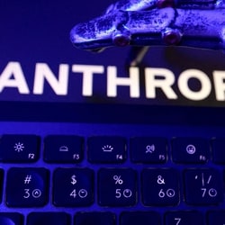 Anthropic logo, a keyboard, and a robotic hand in this illustration taken June 5, 2026.