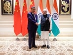 India’s Prime Minister Narendra Modi shakes hands with Chinese President Xi Jinping on the sidelines of the BRICS Summit in New Delh