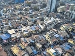 Kamathipura, located at the heart of South Mumbai, is divided into a grid of 15 lanes and encompasses 943 cessed buildings, 349 non-cessed buildings, 14 religious places and two civic schools. The redevelopment plan envisages the rehabilitation of nearly 8,000 families. (Satish Bate/HT PHOTO)