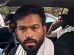 Cockroach Janta Party (CJP) founder Abhijeet Dipke talks to the media as he arrives to visit affected tribal families at a village, in Balaghat district(PTI)