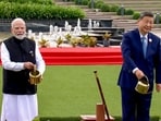 Prime Minister Narendra Modi with Chinese President Xi Jinping during a joint tree plantation initiative amid the ongoing 18th BRICS Summit, at the Bharat Mandapam, in New Delhi.