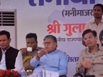 Punjab governor and UT administrator Gulab Chand Kataria (centre) and mayor Saurabh Joshi (right) listening to the complaints of Manimajra residents on Friday. (Sant Arora/HT)