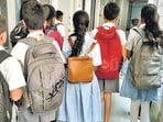 Parents said children sit through lessons in heat and rain and face the possibility of encountering poisonous creatures. 