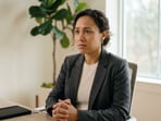 An individual in an interview. (AI-generated image). 