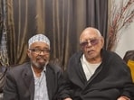 Ayanle (L), pictured with his uncle in London on November 2, 2024, currently resides on a tranquil street in a suburb of Columbus.