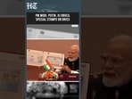 WATCH: Modi, Putin, Xi Display Postage Booklet Celebrating BRICS India 2026