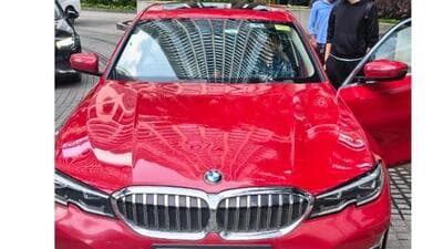 A BMW, along with documents and digital devices containing allegedly incriminating material, was seized.