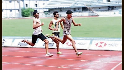 Athletes compete during an event at Guru Nanak Stadium in Ludhiana on Saturday. (HT photo) Athletes compete during an event at Guru Nanak Stadium in Ludhiana on Saturday. (HT photo)