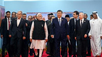Foreground from left: Iranian President Masoud Pezeshkian, Indian Prime Minister Narendra Modi, Chinese President Xi Jinping, Russian President Vladimir Putin, Indonesian President Prabowo Subianto, South African President Cyril Ramaphosa, Crown Prince of Abu Dhabi Sheikh Khaled Bin Mohamed Bin Zayed Al Nahyan, and Ethiopian Prime Minister Abiy Ahmed Ali, visit the exhibition of the "Innovative India" dedicated to the 20th anniversary of the Brics in New Delhi (AP/Pool Sputnik) Foreground from left: Iranian President Masoud Pezeshkian, Indian Prime Minister Narendra Modi, Chinese President Xi Jinping, Russian President Vladimir Putin, Indonesian President Prabowo Subianto, South African President Cyril Ramaphosa, Crown Prince of Abu Dhabi Sheikh Khaled Bin Mohamed Bin Zayed Al Nahyan, and Ethiopian Prime Minister Abiy Ahmed Ali, visit the exhibition of the "Innovative India" dedicated to the 20th anniversary of the Brics in New Delhi (AP/Pool Sputnik)