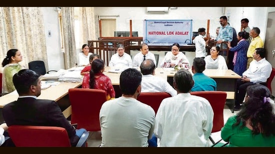 National Lok Adalat being held in Ludhiana on Saturday. (HT PHOTO)