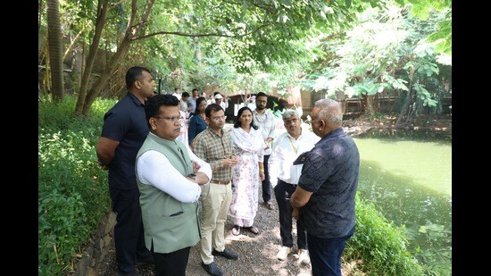 Ram (L) appreciated the use of natural features at the site and asked officials to explore similar green and recreational spaces on available civic land. (HT)