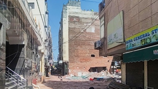 A five-storey building that housed a PG collapsed in Delhi's Satya Niketan area, killing at least seven people, most of them students.(HT Photo/ Vipin Kumar)