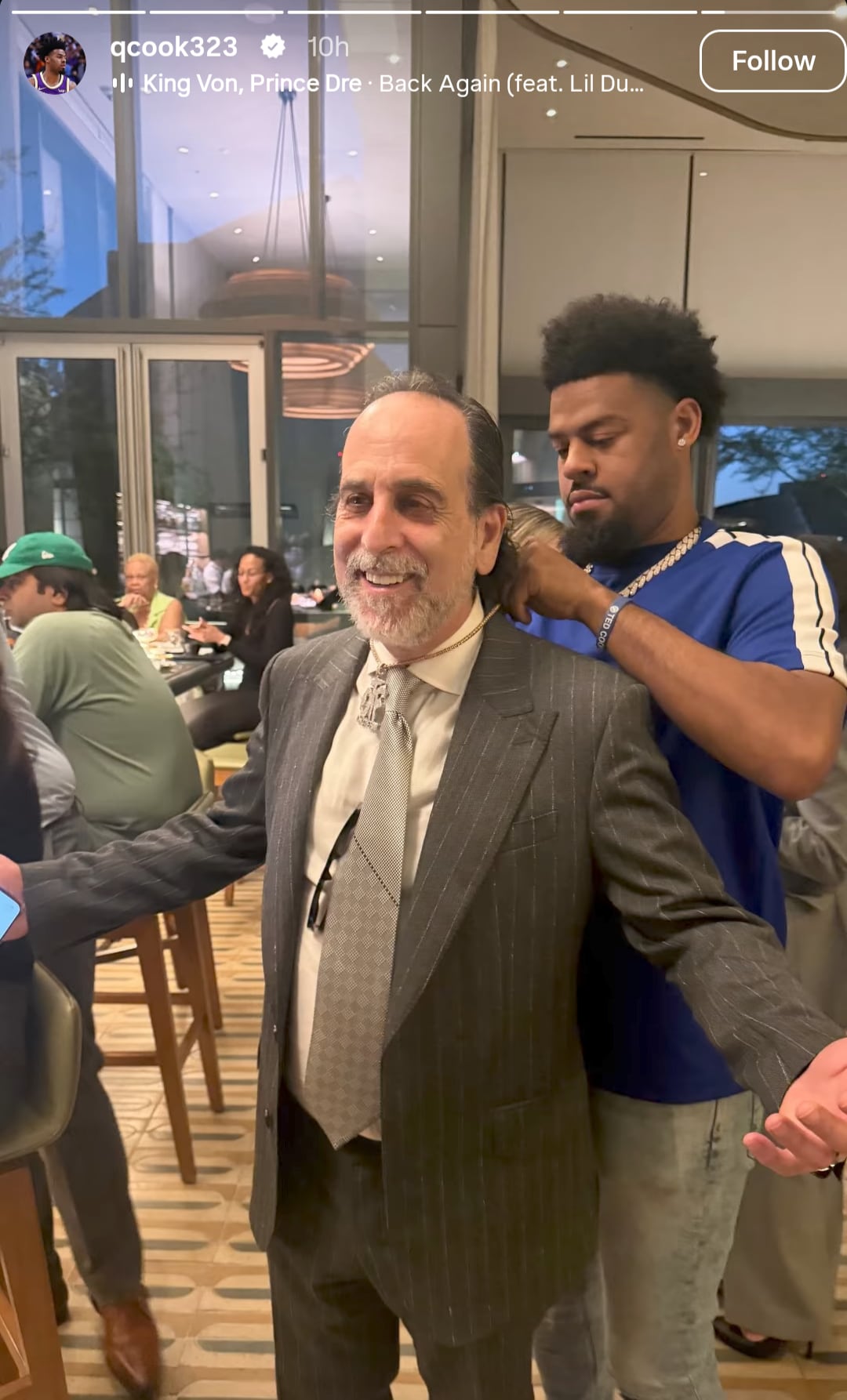 Quinn Cook putting the OTF chain on Drew Findling. (Quinn Cook/ Instagram) Quinn Cook putting the OTF chain on Drew Findling. (Quinn Cook/ Instagram)