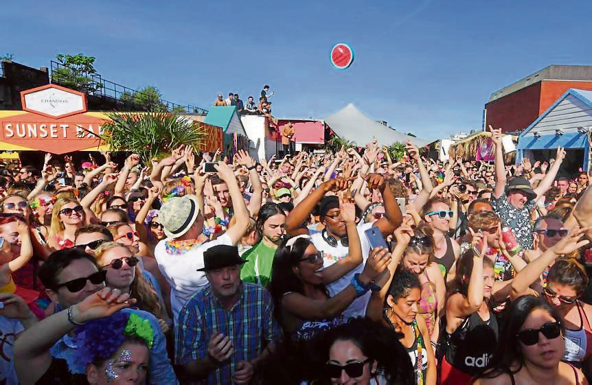 Crowds gather at a sober morning rave at Brixton Beach, London, for an electronic music performance by DJ Fatboy Slim. (Getty Images) Crowds gather at a sober morning rave at Brixton Beach, London, for an electronic music performance by DJ Fatboy Slim. (Getty Images)