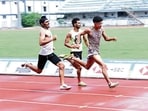 Athletes compete during an event at Guru Nanak Stadium in Ludhiana on Saturday. (HT photo) Athletes compete during an event at Guru Nanak Stadium in Ludhiana on Saturday. (HT photo)