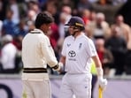 England's Joe Root and Pakistan's Razaullah shake hands following England's victory on day four of the third cricket Test at Edgbaston.