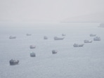 Several explosions were reported overnight around Qeshm, the largest island in the Hormuz Strait.
